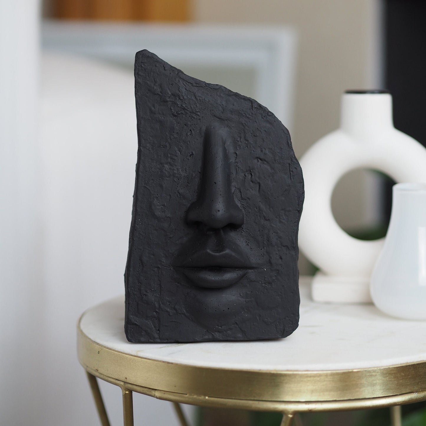 Concrete Face Sculpture