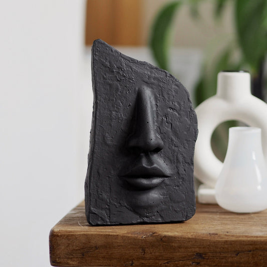 Concrete Face Sculpture