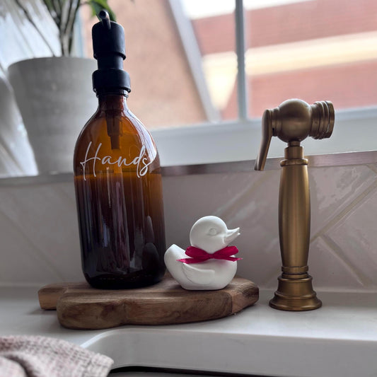 Concrete Duck (with Red Bow)